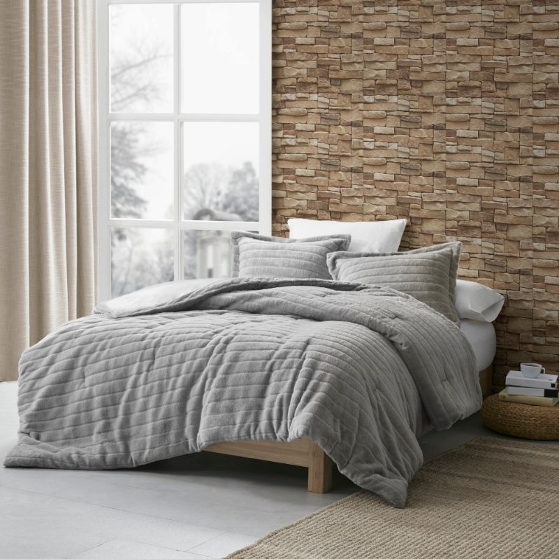 Photo 1 of King/California King 3 Pieces Eve Faux Fur Comforter & Sham Set Gray. Sleep in indulgent, cozy comfort with the Madison Park Eve Faux Fur Comforter Set. The soft and plush comforter features heavyweight carved faux fur with a cozy plush reverse and hypoal