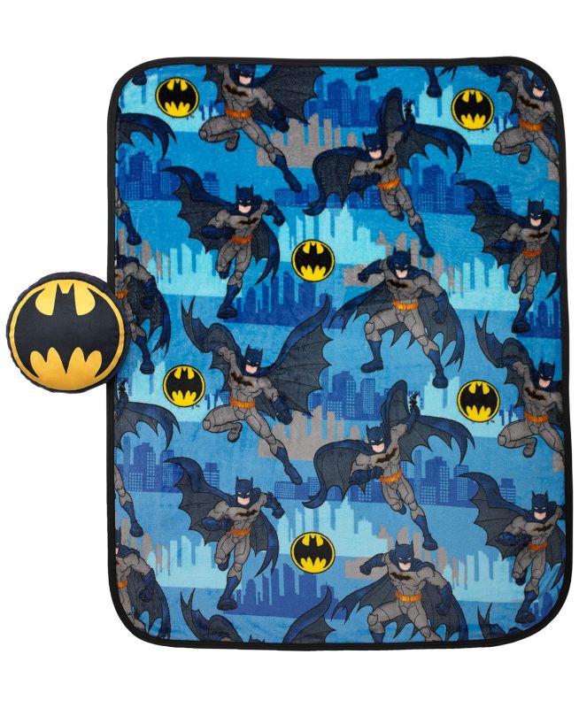 Photo 1 of Batman Pillow & Throw Nogginz Set. Get set for crime-fighting adventures at sleepovers and playdates with this Batman pillow and throw set. Superheroes and fans alike will love the throw's super-soft design as well as the bat symbol printed on the coordin