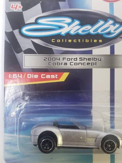 Photo 1 of 2004 Ford Mustang Shelby Cobra Grey with dual White Stripes 1/64 Diecast Model Car by Gear'd up. Collectible