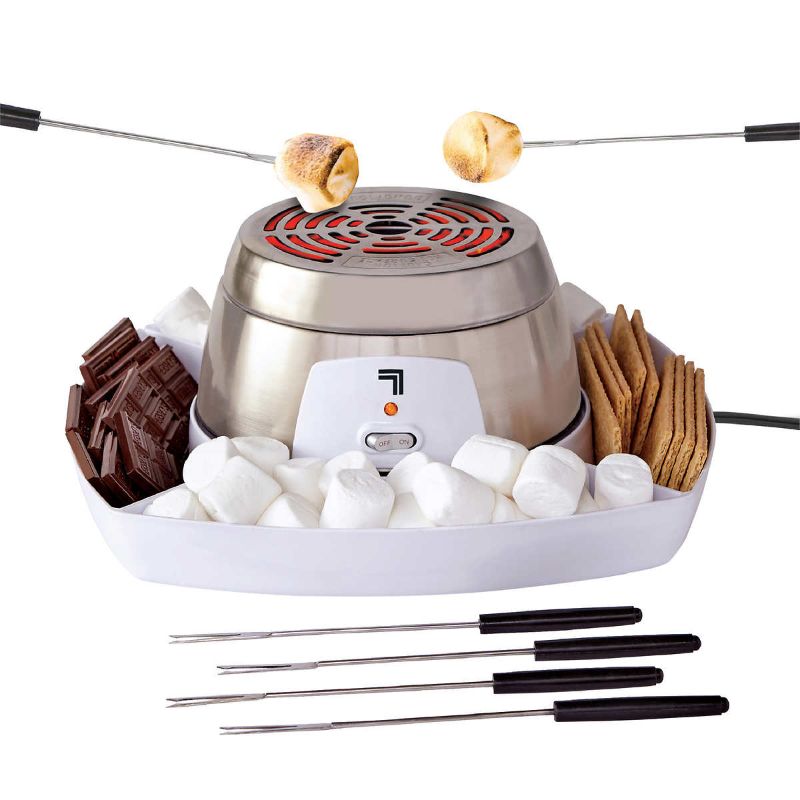 Photo 1 of Sharper Image Electric S'mores Maker. Safely roast marshmallows and make s'mores right in your kitchen. Bring the campfire experience right to your kitchen or dining room with the Sharper Image S'mores Maker. The set includes everything you need to (safel