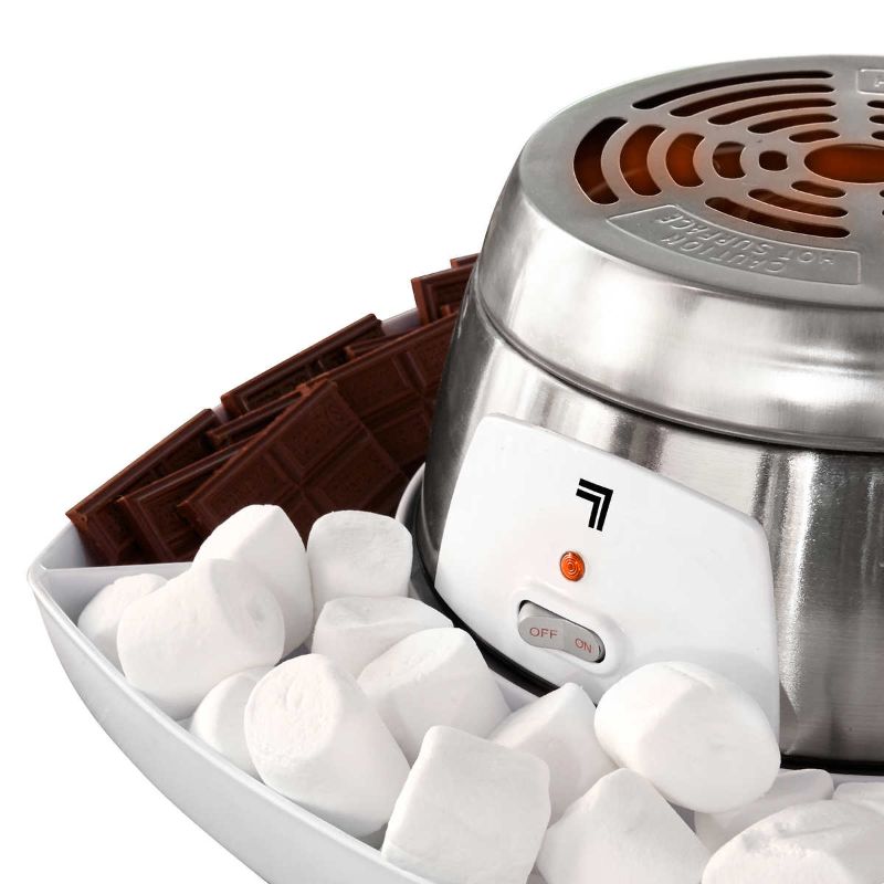 Photo 2 of Sharper Image Electric S'mores Maker. Safely roast marshmallows and make s'mores right in your kitchen. Bring the campfire experience right to your kitchen or dining room with the Sharper Image S'mores Maker. The set includes everything you need to (safel