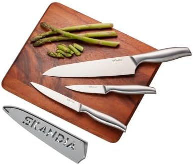 Photo 2 of German Stainless Steel; Tapered-edge Precision Blades; Ergonomically Designed Handles; Blade Guards for Safe Storage; 25 Year Limited Warranty; Includes: (1) 8" Chef’s knife with blade guard (1) 8" Bread knife with blade guard; (1) 7" Santoku knife with b