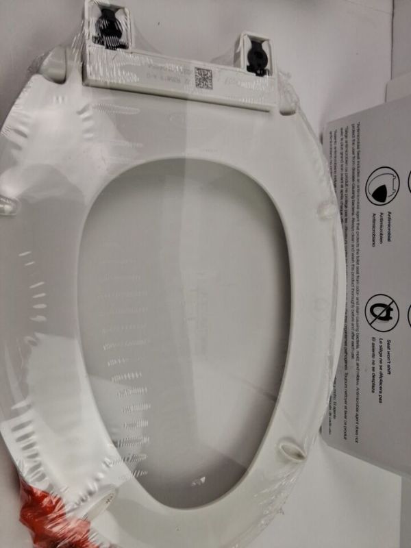 Photo 1 of Kohler Layne Quiet Close Release Elongated Antimicrobial Toilet Seat White. This Kohler Layne toilet seat is a perfect addition to any modern bathroom. It comes in a sleek white color and is compatible with Kohler brand toilets. The elongated shape of the