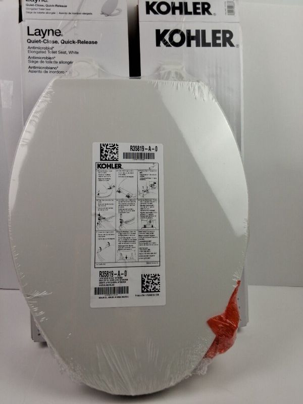 Photo 2 of Kohler Layne Quiet Close Release Elongated Antimicrobial Toilet Seat White. This Kohler Layne toilet seat is a perfect addition to any modern bathroom. It comes in a sleek white color and is compatible with Kohler brand toilets. The elongated shape of the