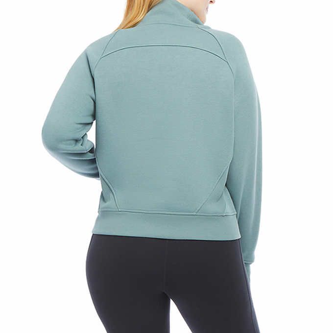 Photo 2 of SIZE L - Costco Danskin Ladies' Cozy Half-Zip Pullover. Super soft polyester/rayon/spandex brushed fleece construction. Front half zipper closure with kangaroo pocket and rib trim banded bottom. Lightweight, soft, breathable fabrication that will provide 