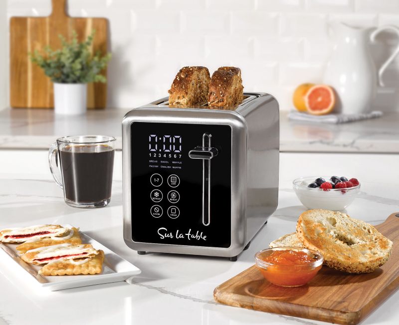 Photo 1 of TOUCHSCREEN 2-SLICE TOASTER - The Sur La Table 2-Slice Toaster is a must have in any kitchen. 7 Toast Shade settings from light to dark
LED illuminated touchscreen display with countdown timer. Customizable slots for thick or thin bread. Removable crumb t