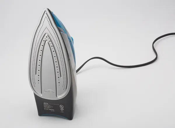 Photo 4 of The Sunbeam Turbo Steam Master GCSBCS-212 is a conventional steam iron. It has a stainless steel soleplate, a large water reservoir, and a burst of steam function. The iron also has an auto-shutoff safety feature that turns it off if it's left stationary 