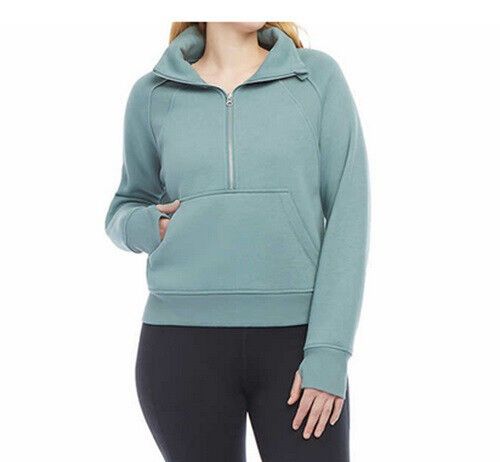 Photo 1 of SIZE M - Danskin Cozy Half-Zip Fleece Pullover Sweatshirt Tidewater Teal. Upgrade your activewear with this cozy half-zip fleece pullover sweatshirt from Danskin. Made with polyester material and fleece fabric type, this sweatshirt is sure to keep you war