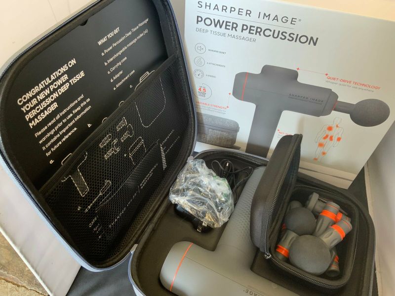 Photo 2 of Sharper Image Power Percussion Deep Tissue Massager. The Sharper Image Power Percussion Deep Tissue Massager is the post-workout recovery tool you need and the muscle repairer you deserve. This state-of-the-art massager uses percussion to target sore musc