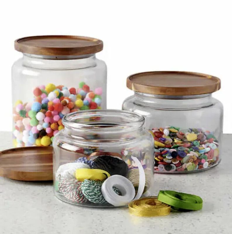 Photo 1 of Anchor Hocking 3 Piece Glass Jar Set with Wood Lids, includes 1pc 48oz, 1 pc 64oz and 1 pc 96oz