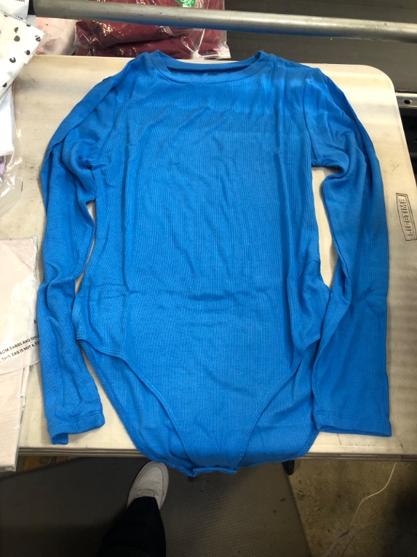 Photo 1 of blue womens long sleeve bodysuit size med 