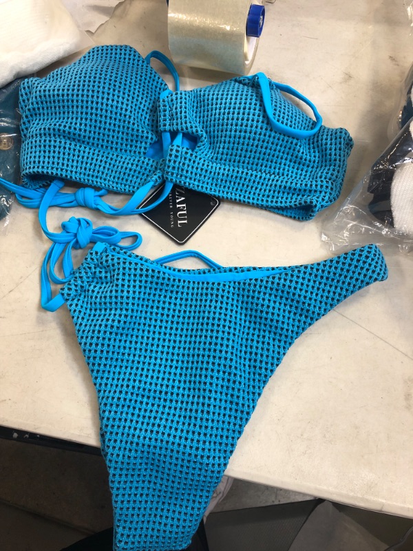 Photo 2 of 2 piece blue bathing suit size 4 