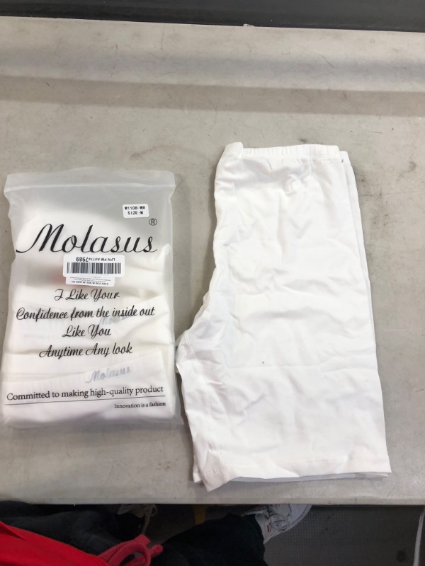 Photo 1 of 4 pack of white shorts size medium 