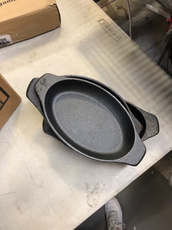 Photo 1 of 6 piece cast iron bowls