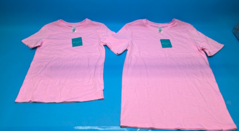 Photo 1 of 810855… 2 kids t-shirts size small and large 