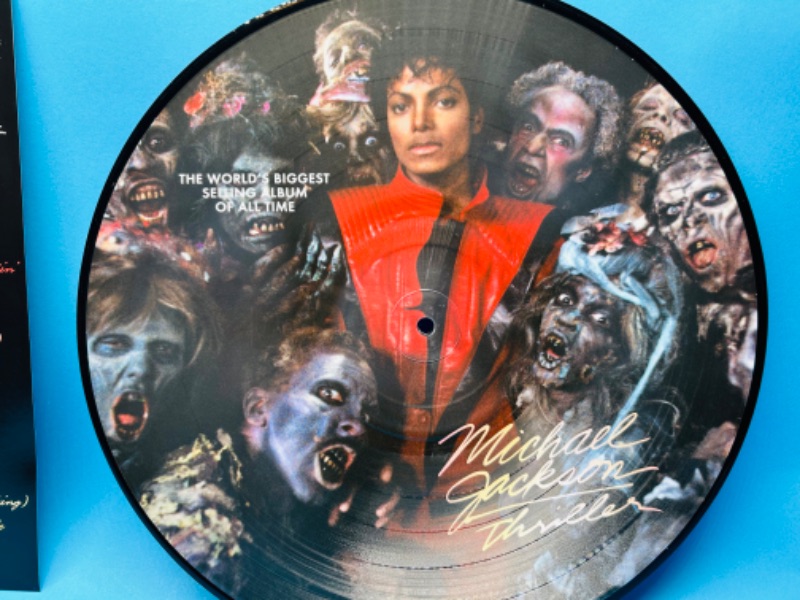 Photo 2 of 811102…Michael Jackson Thriller vinyl picture record in plastic sleeve  33 rpm 