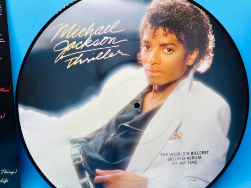 Photo 4 of 811102…Michael Jackson Thriller vinyl picture record in plastic sleeve  33 rpm 