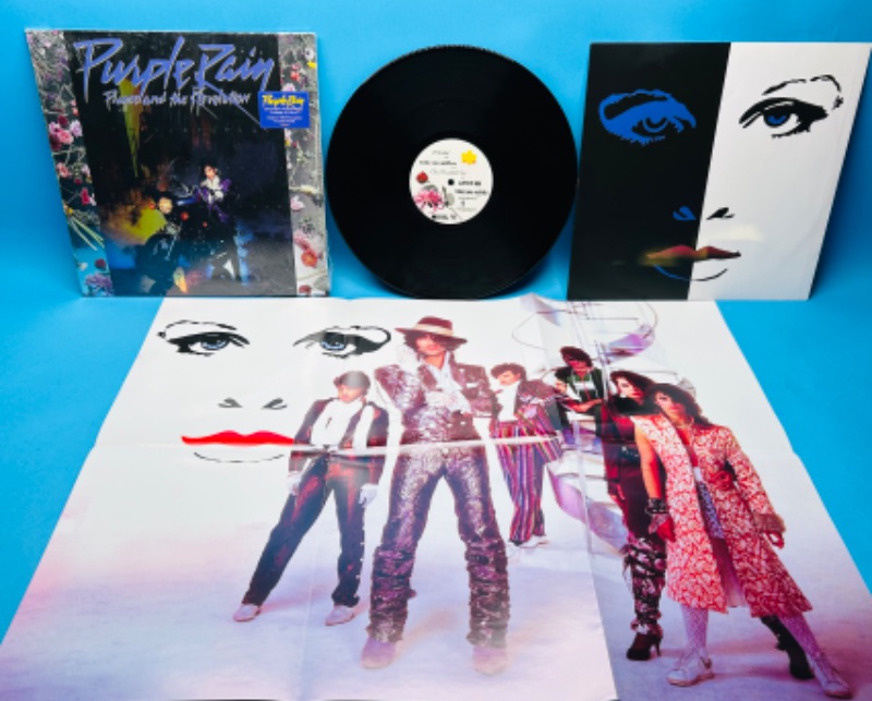 Photo 3 of 811104… Prince Purple Rain vinyl record with poster in plastic sleeve 33 rpm 