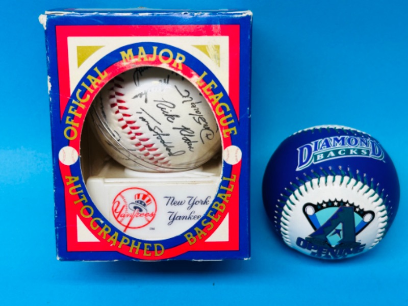 Photo 1 of 811138…New York Yankees autographed baseball and opening day Diamond Backs ball
