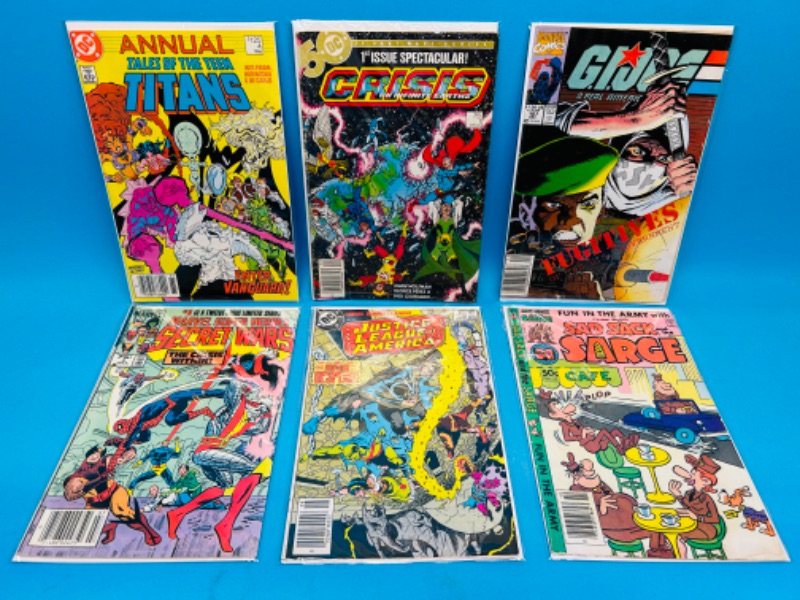 Photo 1 of 811175…6 older  comics in plastic sleeves 