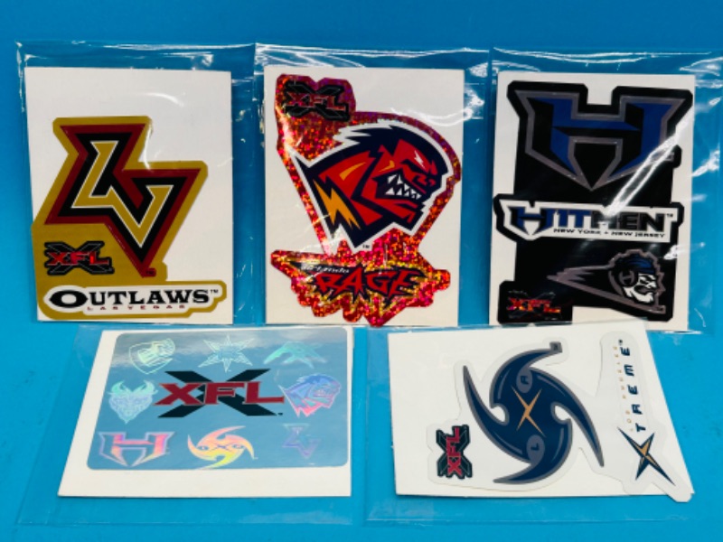 Photo 1 of 811254… 5 vintage vending prism XFL football team stickers in plastic 