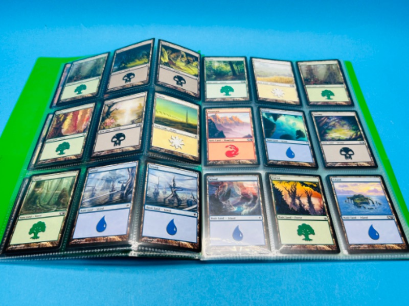 Photo 1 of 811276…126 magic the gathering cards in binder 