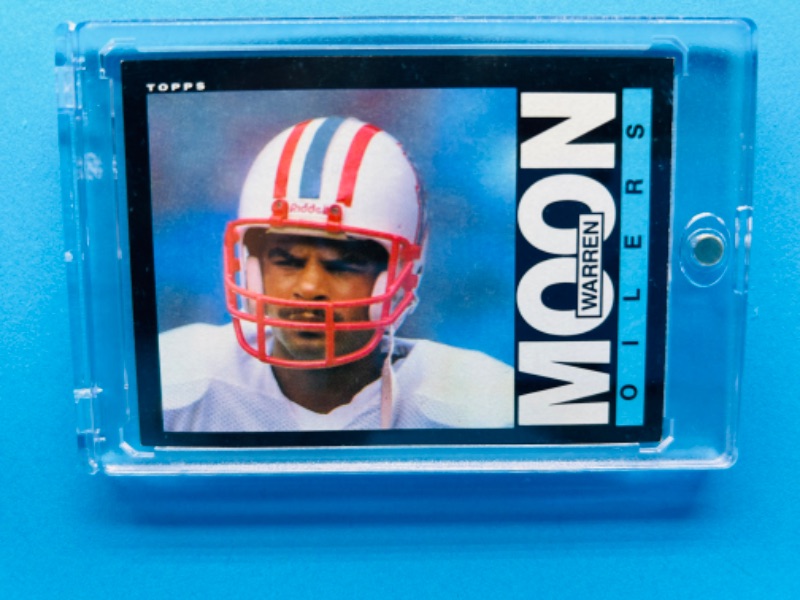 Photo 1 of 811282…Warren Moon rookie card 251 Topps in hard plastic case