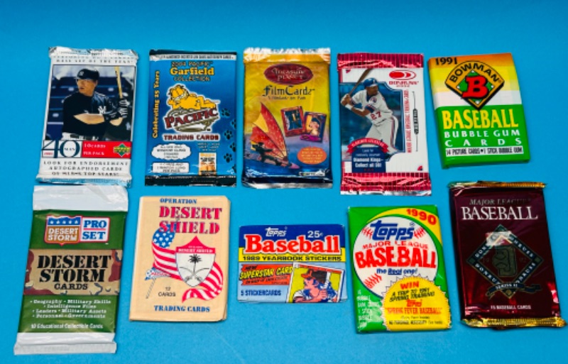 Photo 1 of 811295…10 sealed collectible sports card packs 