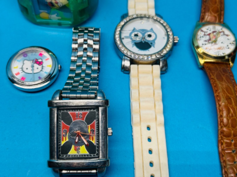 Photo 2 of 811304…used character watches- need batteries some have damage and wear