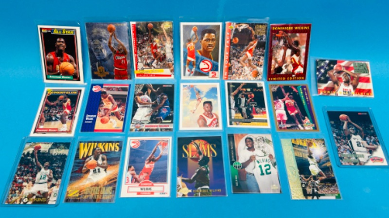 Photo 1 of 811342…20 Dominique Wilkins trading cards in plastic sleeves 