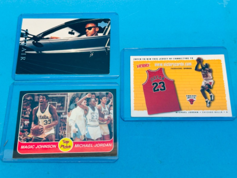 Photo 1 of 811343…3 Michael Jordan cards in hard plastic sleeves 