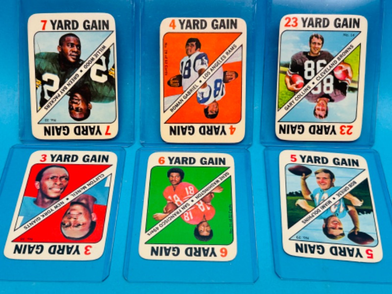 Photo 1 of 811379…vintage Topps football cards in hard plastic sleeves 