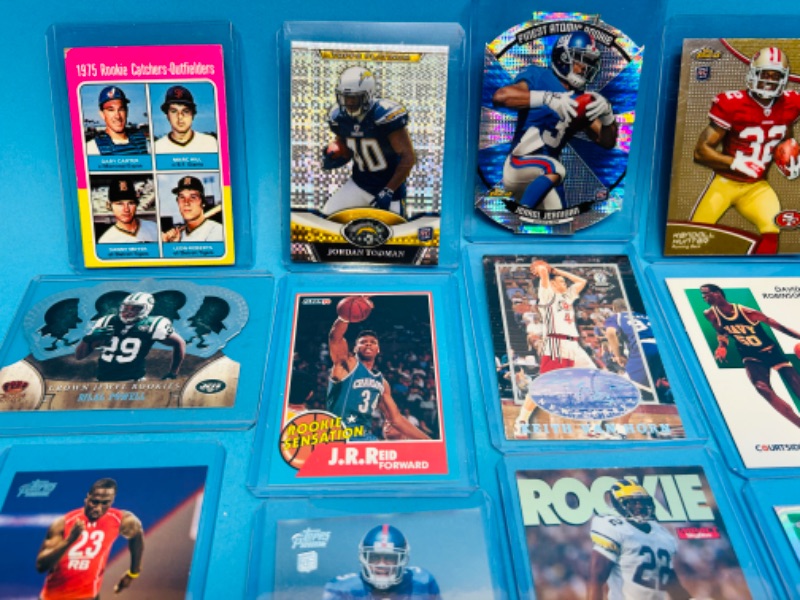 Photo 3 of 811384…Rookie sports cards in hard plastic sleeves 