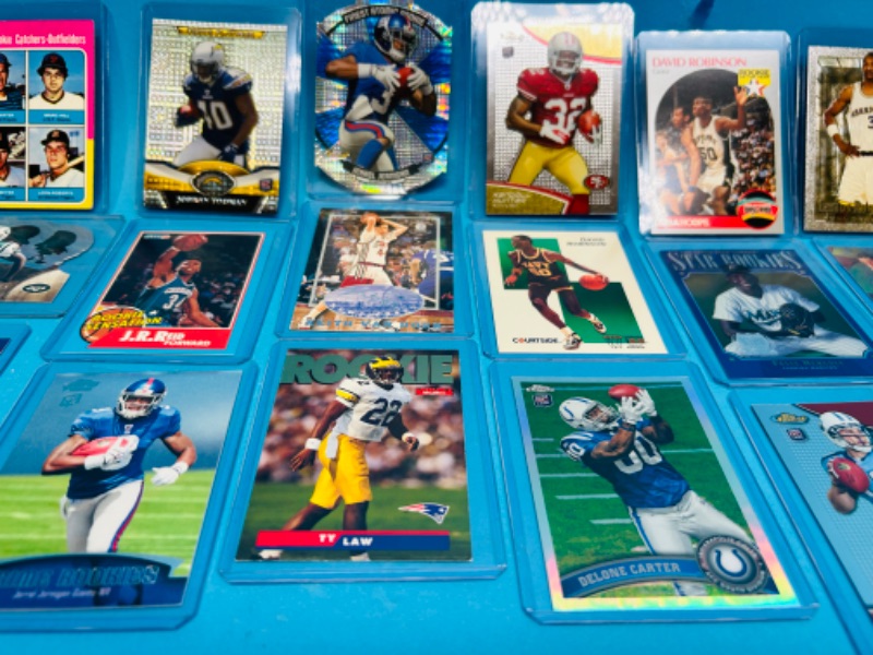 Photo 2 of 811384…Rookie sports cards in hard plastic sleeves 