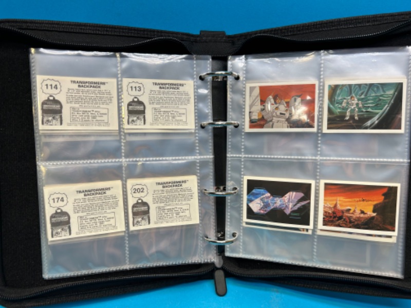 Photo 2 of 811388…60 vintage 1986 transformers backpack stickers in binder 