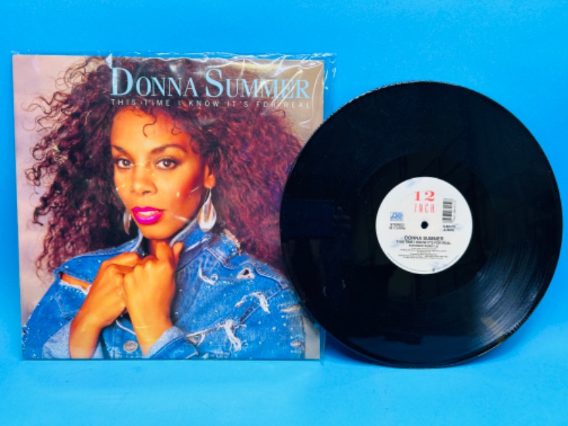 Photo 1 of 811395…Donna Summer vinyl record 33 rpm in plastic sleeve 