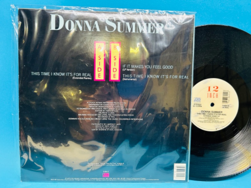 Photo 2 of 811395…Donna Summer vinyl record 33 rpm in plastic sleeve 