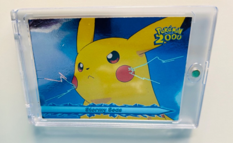 Photo 1 of 811412…Pokémon Stormy Seas Pikachu holo mirror card in hard plastic case