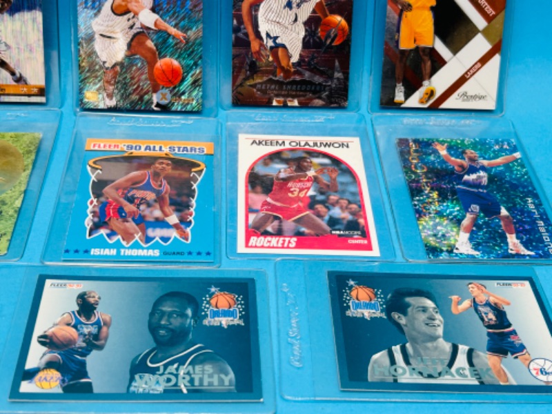 Photo 2 of 811420… collectible basketball cards in hard plastic sleeves 