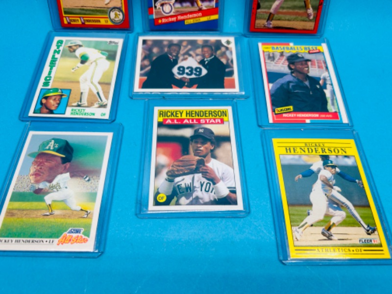 Photo 2 of 811443…9 Rickey Henderson trading cards in hard plastic sleeves 