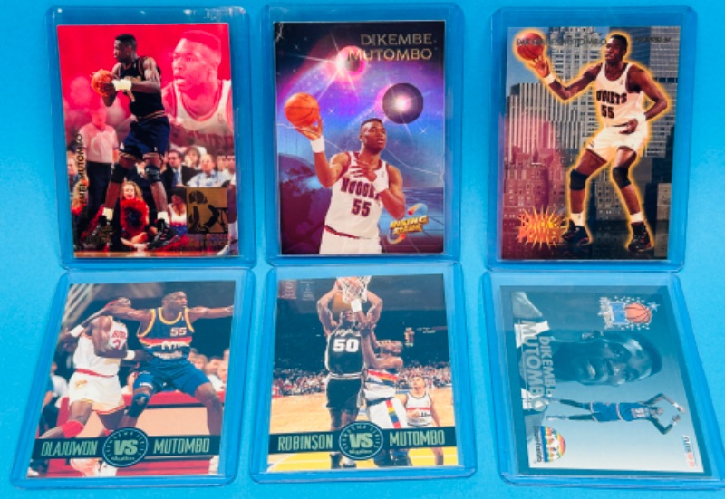 Photo 1 of 811491…6 Dikembe Mutombo trading cards  in hard plastic sleeves 