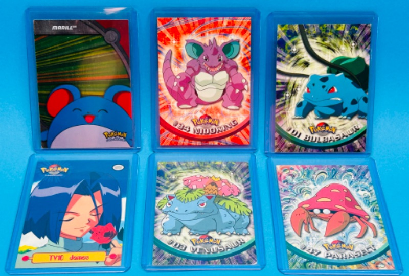 Photo 1 of 811506…6 topps Pokémon cards in hard plastic sleeves 