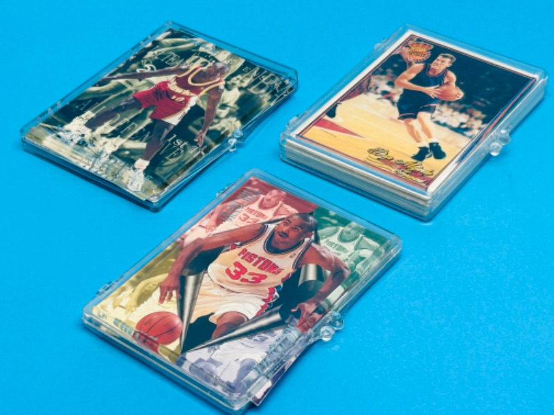 Photo 1 of 811514…3 basketball card sets in cases 1-10, 1-20, and 1-10