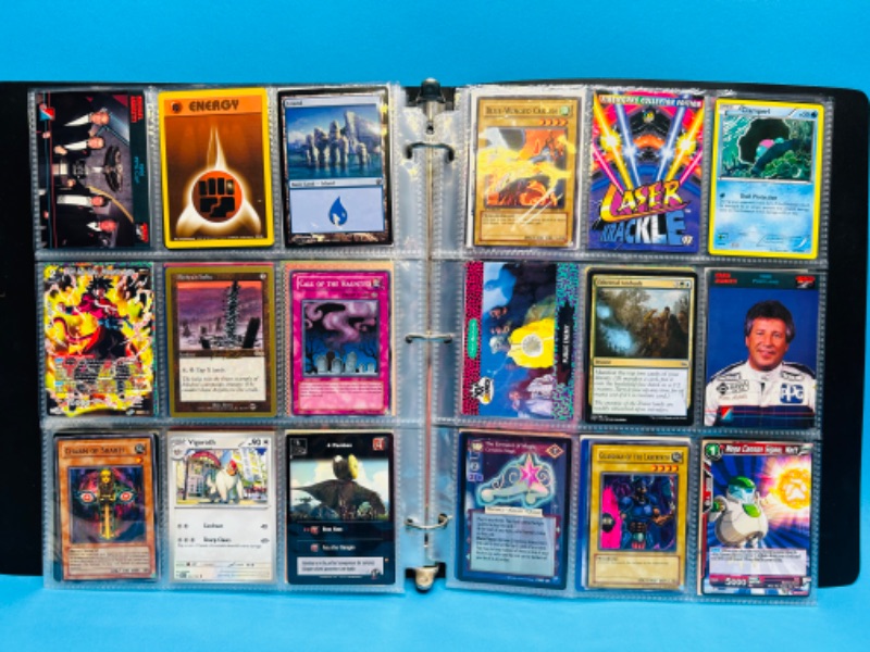 Photo 1 of 811528…252 mixed character and game cards in binder