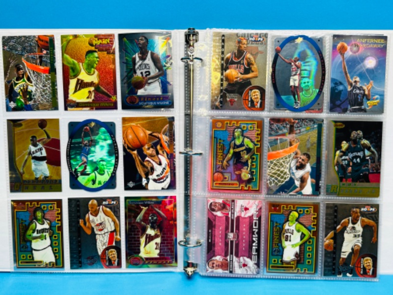 Photo 1 of 811529…216 mixed basketball refractor, chrome, and foil cards in binder 