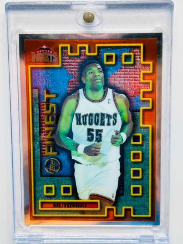 Photo 1 of 811539…topps finest Dikembe Mutombo chrome card M42  in hard plastic case 