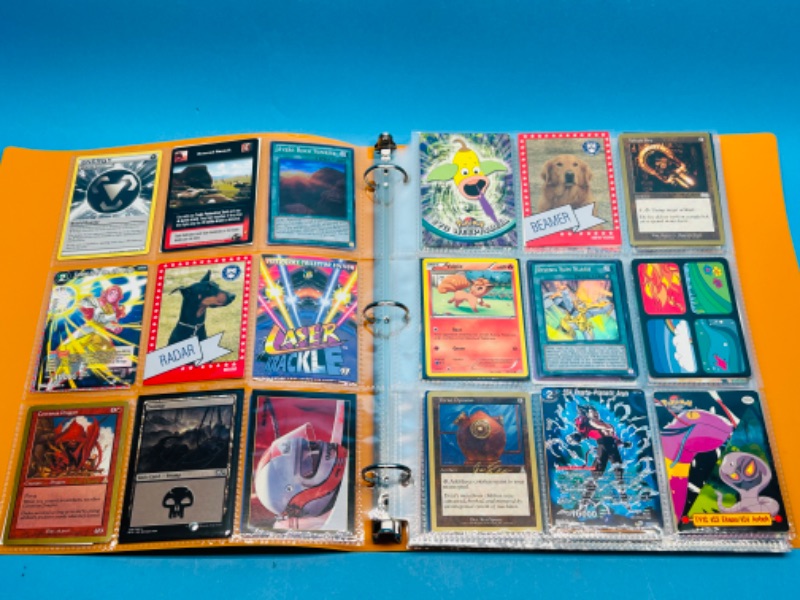 Photo 1 of 811611…216 character and game trading cards in binder 