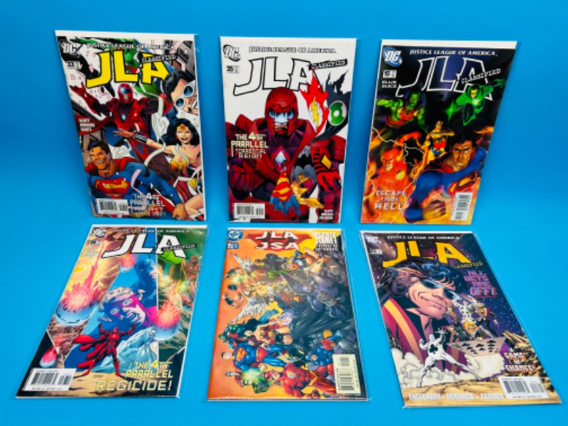 Photo 1 of 811628…6 JLA comics in plastic sleeves 