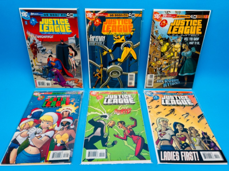 Photo 1 of 811655…6 Justice League  comics in plastic sleeves 