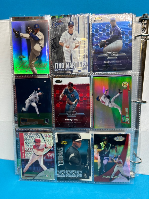 Photo 12 of 811659…252 mixed baseball refractor, chrom, foil and holo cards in binder. All pages photoed